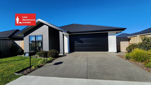 Modern Four-Bedroom Home with Lawn Maintenance Included